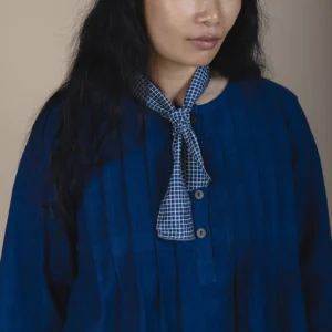 woman wearing indigo dyed cotton shirt