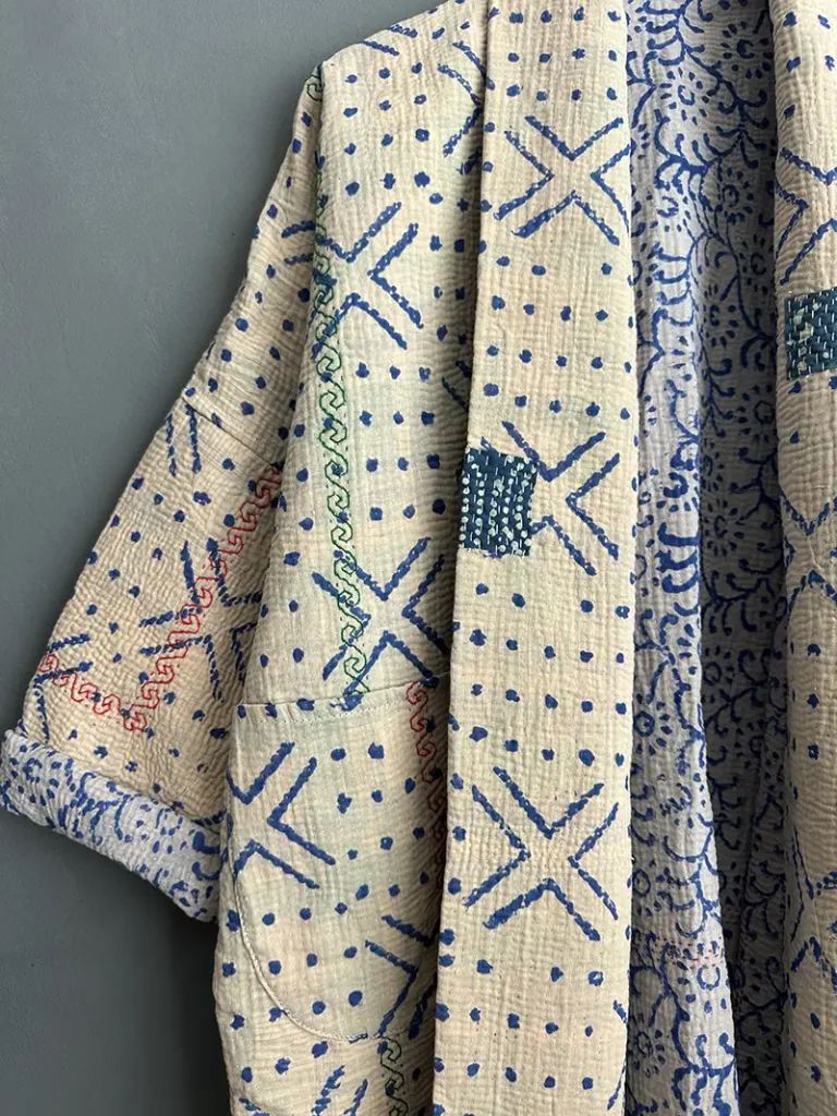 zoom in of blue and white kantha jacket