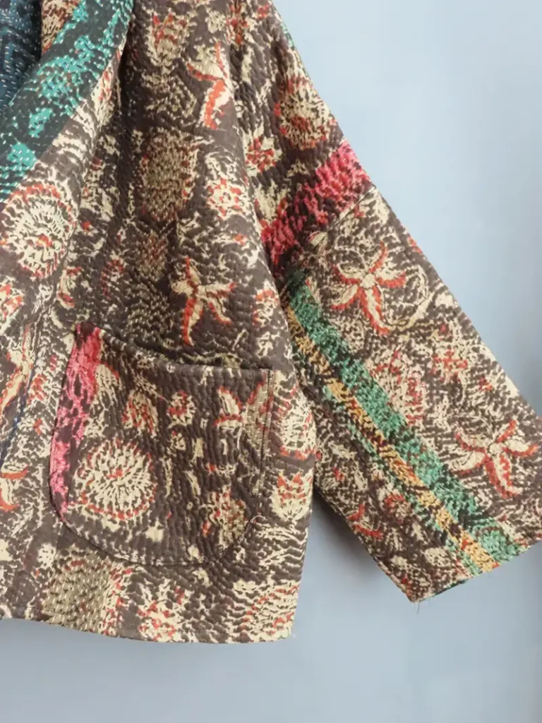 zoom in of brown and black kantha jacket