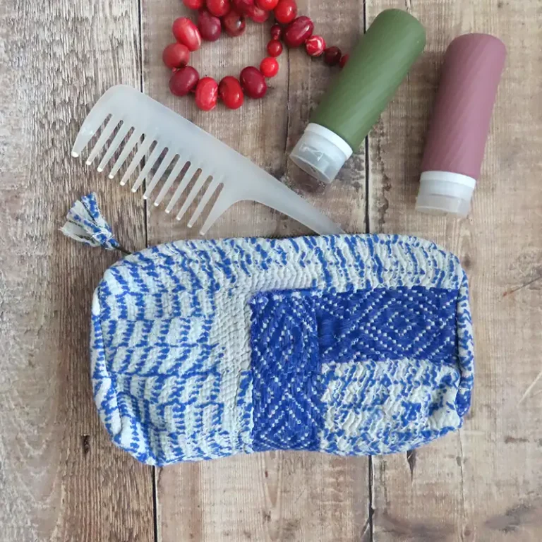blue and white kantha purse with accessories