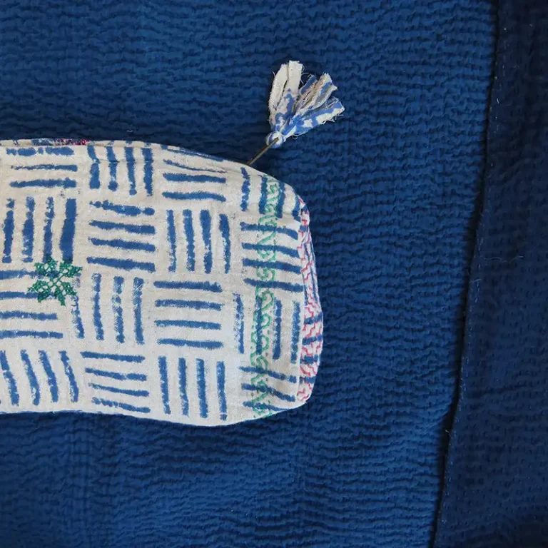 zoom in of blue and white vintage kantha fabric zipped pouch