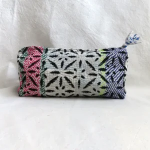 black and white kantha pouch on white background