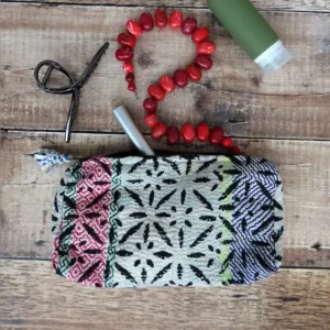 black and white kantha pouch with toiletries