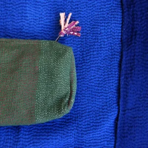 zoom in of green vintage kantha fabric pouch