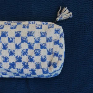 zoom in of blue checker zipped pouch
