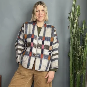 woman wearing grey checked wool jacket