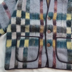 zoom in of hand woven wool jacket