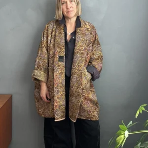 woman wearing indian kantha jacket