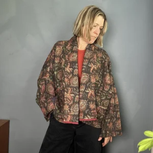 woman wearing short indian kantha jacket