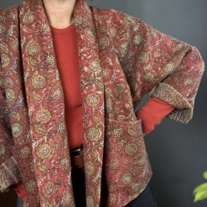 zoom in of rust colour kantha jacket