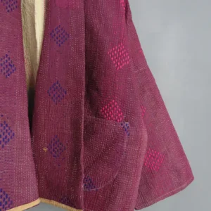 zoom in of deep purple kantha sticthing on a kantha jacket