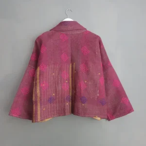 back view of a kantha jacket with deep purple stitching