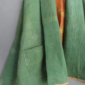 zoom in of green kantha jacket