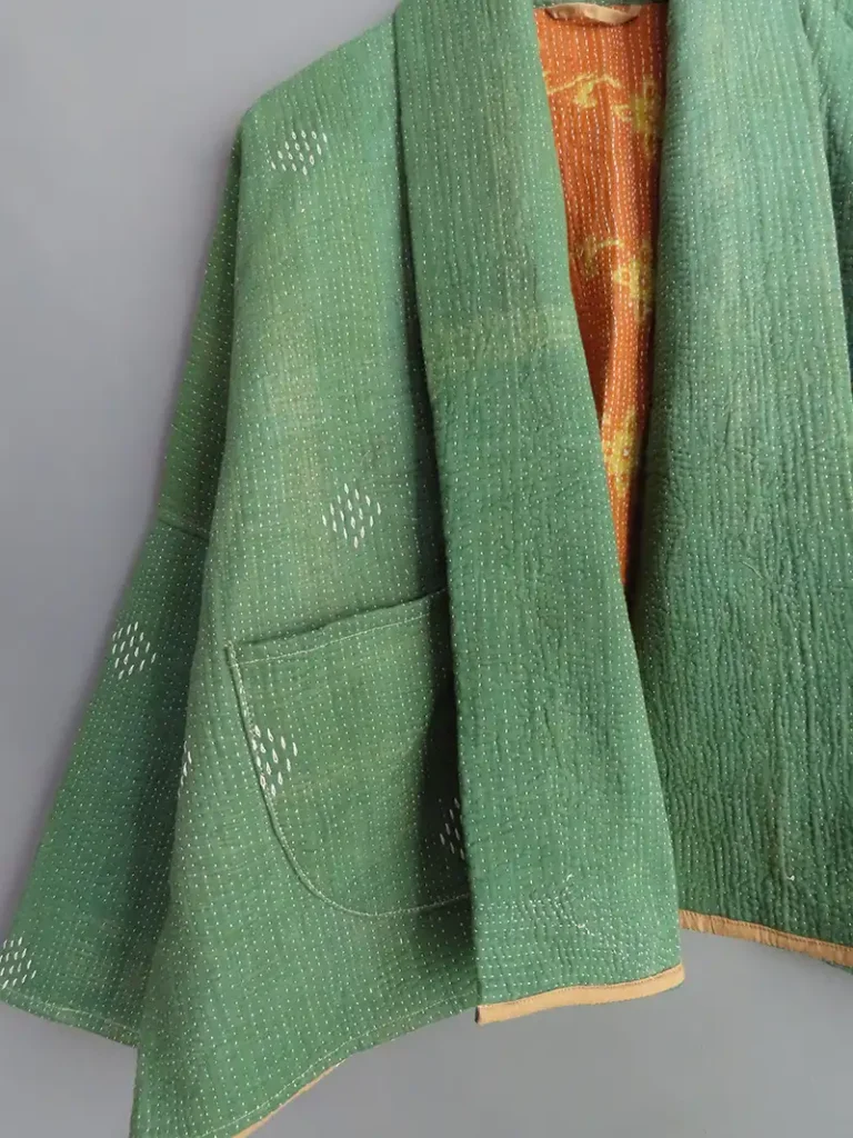 zoom in of green kantha jacket