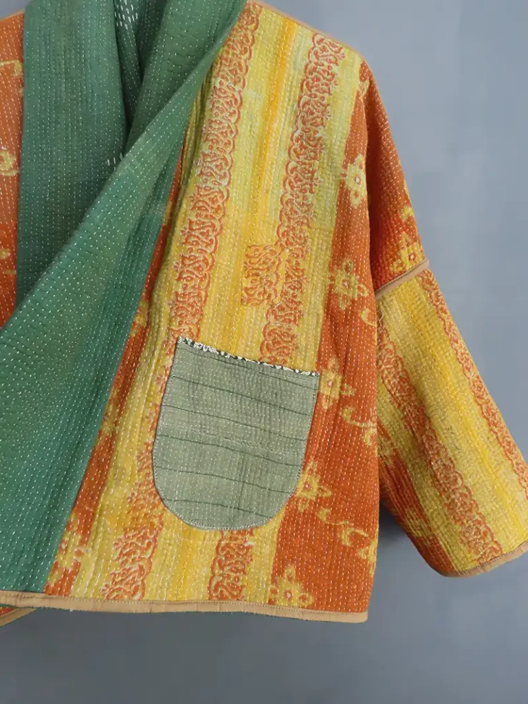 reversible kantha jacket with orange patterned lining