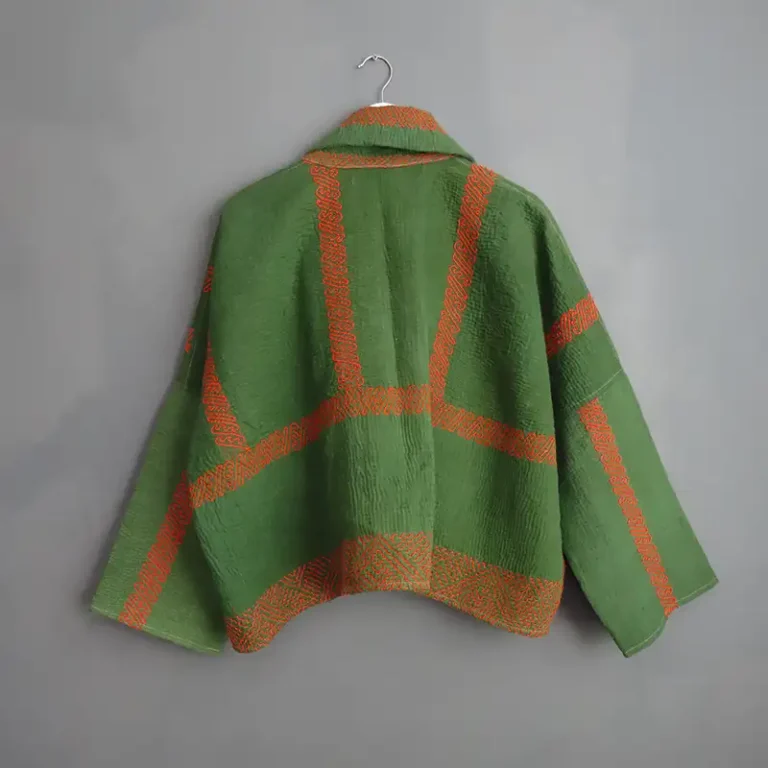 back view of a short green kantha jacket