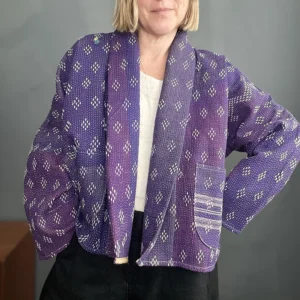 woman wearing a purple kantha jacket