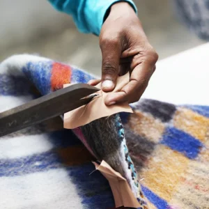 zoom in of a tailors hands